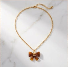 Load image into Gallery viewer, Upcycled Designer Pendant Necklace #110 - Resin Bow