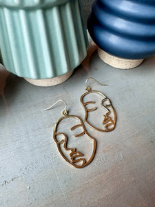 Golden Face Dangle Earrings