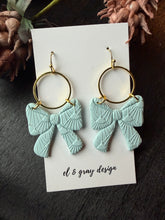 Load image into Gallery viewer, Blue Bow Dangle Earrings
