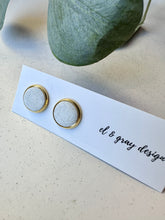 Load image into Gallery viewer, Stud Earrings - Speckled White + Gold Rim
