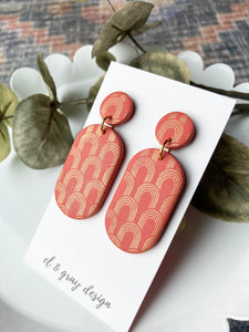 Rusty Oval Earrings With Golden Arch Details